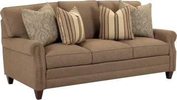 a couch with pillows and pillows on it