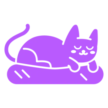 a purple cat laying on top of a pillow