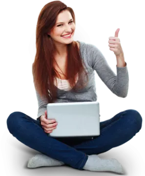 a woman sitting on the floor with her laptop