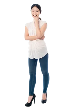 a woman standing with her arms crossed