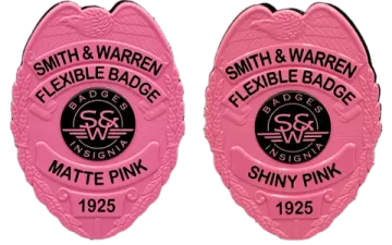 a pair of pink police badges