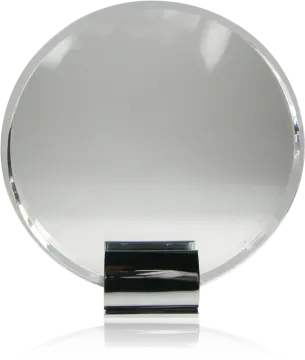 a round mirror on a white background