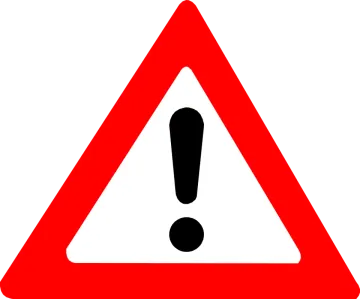 a red triangle with a black and white sign on it