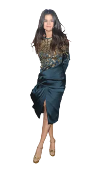 a woman in a blue dress and gold shoes