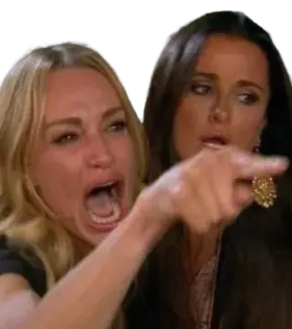 two women are pointing their fingers at the camera