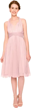 a young girl wearing a pink dress