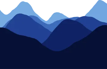 a mountain landscape with blue mountains and clouds
