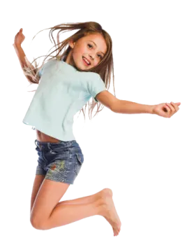 a young girl jumping in the air