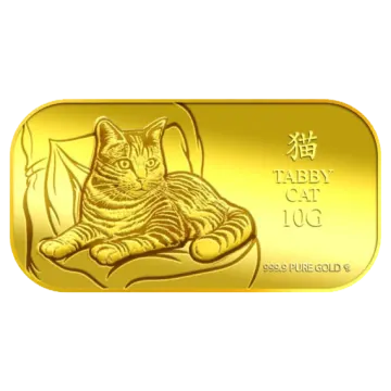 a gold bar with a cat on it
