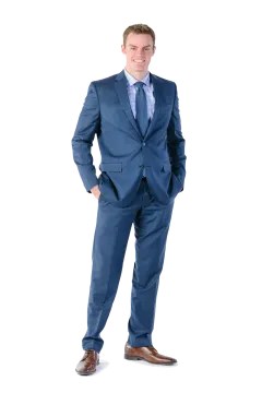 a man in a blue suit and tie