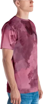 a man wearing a t - shirt with watercolor paint on it