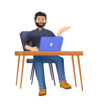 a man sitting at a desk with his laptop