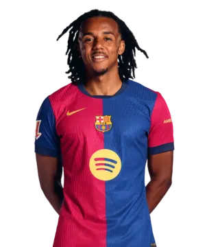 a young man wearing a barcelona fc home shirt