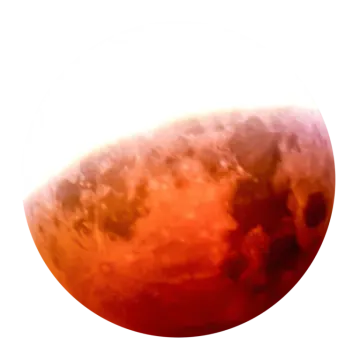 a red moon is shown in the sky