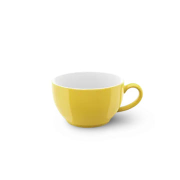 a yellow cup on a white background