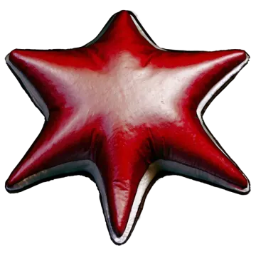 a red and white star shaped balloon