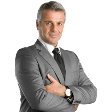 a man in a suit with his arms crossed
