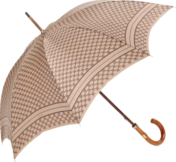 a brown and white umbrella with a wooden handle