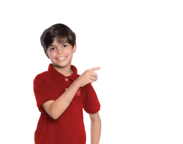 a boy in a red polo shirt pointing at the camera