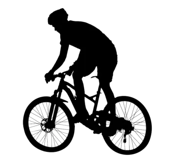 a silhouette of a man riding a bike
