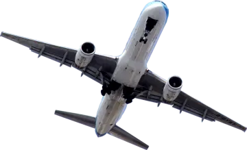 an airplane flying in the sky with its landing gear