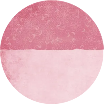 a pink circle with white flowers on it