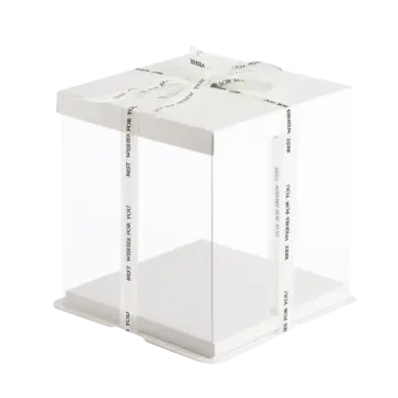 a white box with a ribbon tied around it