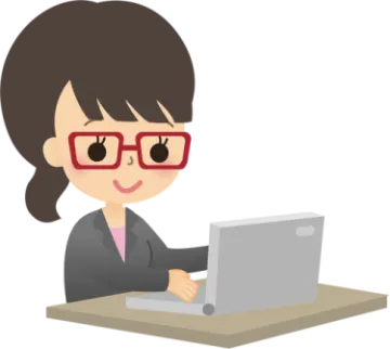 a woman in glasses working on her laptop