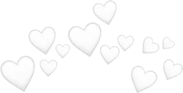 a group of white hearts floating in the air