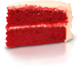 a piece of red velvet cake with white frosting