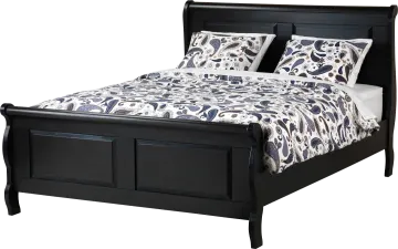a bed with a black frame and headboard