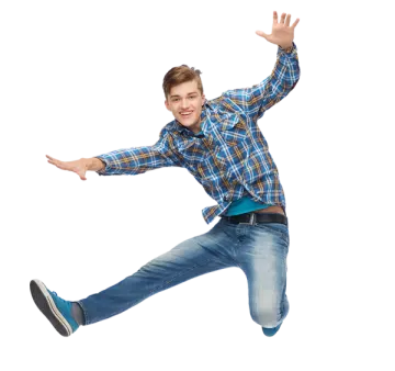 a young boy jumping in the air