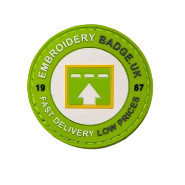 a green and white badge with an arrow in the center