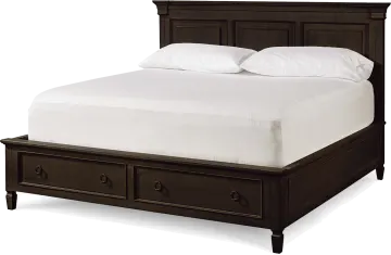 a bed with two drawers underneath it