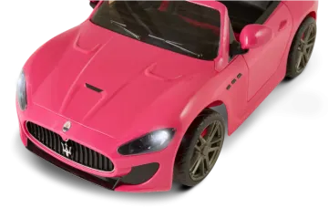 a pink toy car on a white background