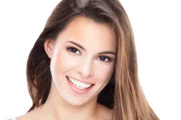 a woman with long brown hair smiling at the camera