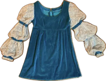 a blue velvet dress with lace sleeves and cuffs