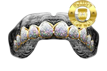 a gold and silver ring with diamonds on it