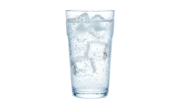 a glass filled with water on a white background