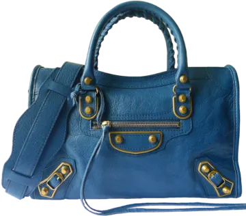 a blue handbag on a white background