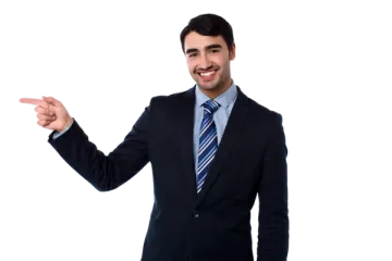 a man in a suit pointing at something