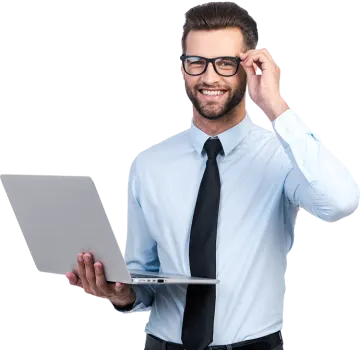 a man in a blue shirt and tie holding a laptop