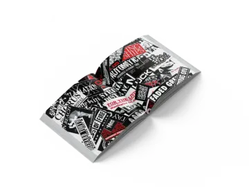 a black and white business card with red lettering on it