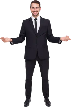 a man in a suit and tie standing with his hands out