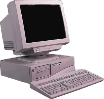an old computer sitting on top of a desk