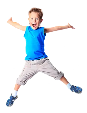 a young boy is jumping in the air