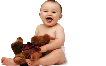 a baby sitting on the floor with a teddy bear