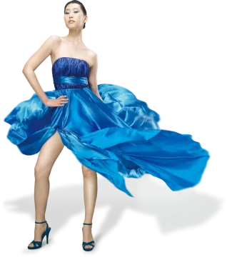 a woman wearing a blue dress and heels