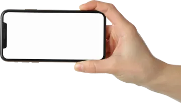 a person holding a smart phone in their hand