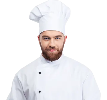 a man wearing a chef's hat and holding a knife